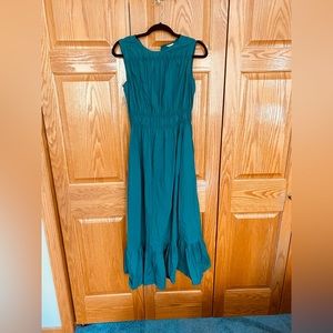 Teal sun dress from a new day! Size medium. This dress has pockets too:)